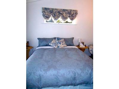 Австрийские шторы в спальне фото в интерьере пример 173