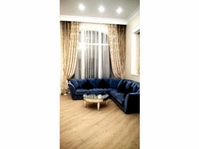 Классические шторы в гостиной фото в интерьере пример 2172