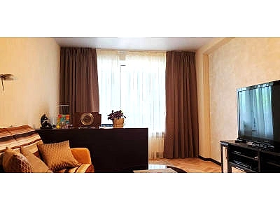 Классические шторы в гостиной фото в интерьере пример 2270