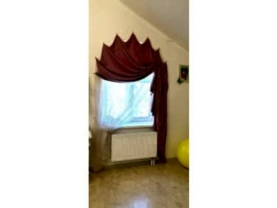 Классические шторы в гостиной фото в интерьере пример 2299