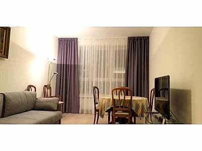 Классические шторы в гостиной фото в интерьере пример 2321