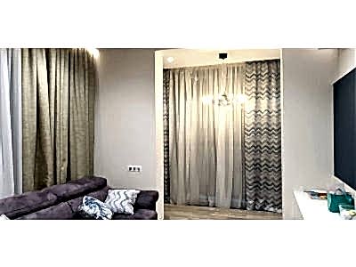 Классические шторы в гостиной фото в интерьере пример 2507