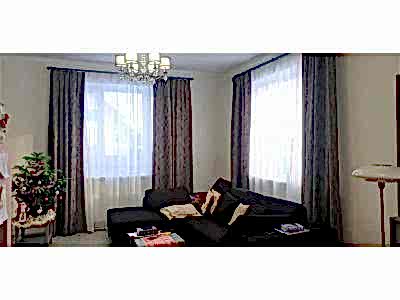 Классические шторы в гостиной фото в интерьере пример 2534