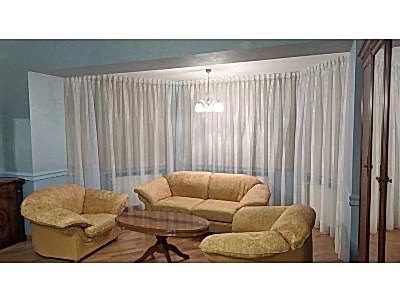 Тюлевые шторы в гостиной фото в интерьере пример 2671